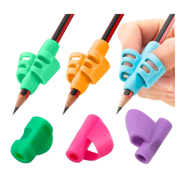 Child using a triangular pencil grip aid for dyslexia handwriting support